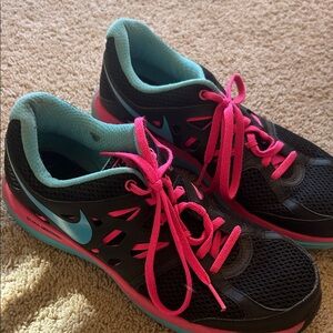 Nike Women's Black and Teal Athletic Shoes with Pink Accents